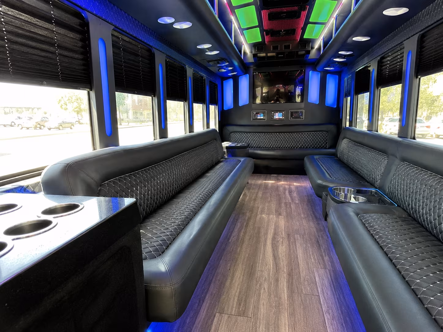 Wraparound seating inside a party bus rental serving Aurora